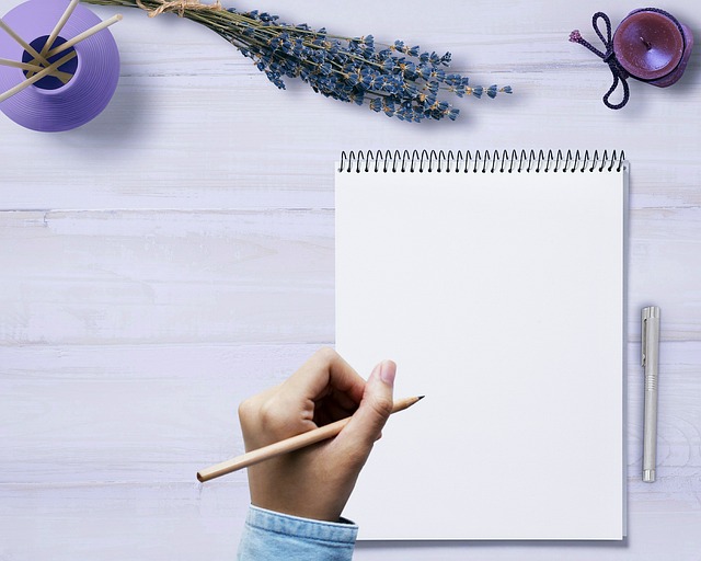 calm workspace with notebook and tea cup for wellness planning